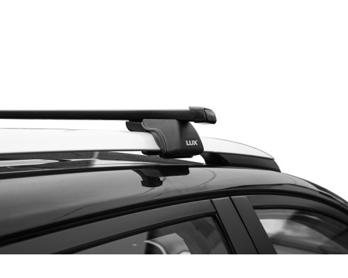 Багажник на крышу LUX КЛАССИК (Прямоугольные дуги Сталь) 140 см для с рейлингами Фото