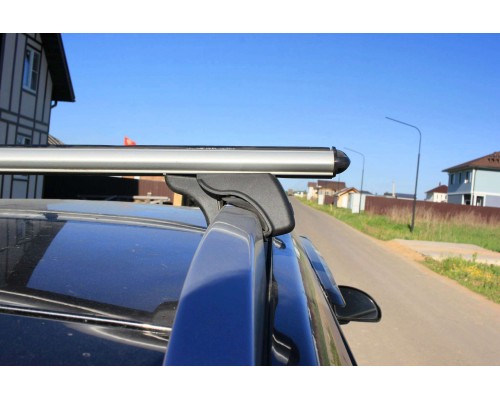 Багажник на рейлинги LUX Классик для Hyundai Tucson 2 (2009-2015) кроссовер / Хендай Туксон 2 (Аэродинамические дуги) 120 см Фото