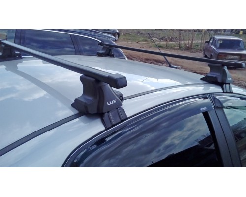 Багажник на крышу D-LUX 1 для Toyota Corolla E120/E130 (2000-2007) хэтчбек 5-дв. (Прямоугольные дуги Сталь) Фото